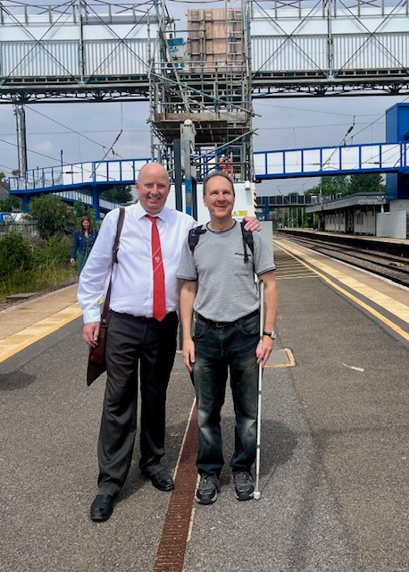 Julian Vaughan and Paul Day of the Bedfordshire Rail Access Network standing on the Northbound Platform at Biggleswade station.